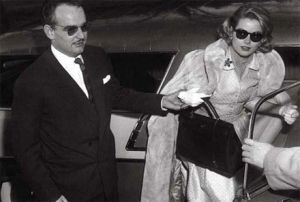 grace kelly and prince ranier with the hermes kelly bag.jpg